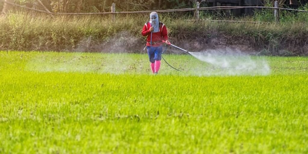 man using spray product confidently